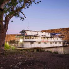 7 Night Proud Mary on river at dusk